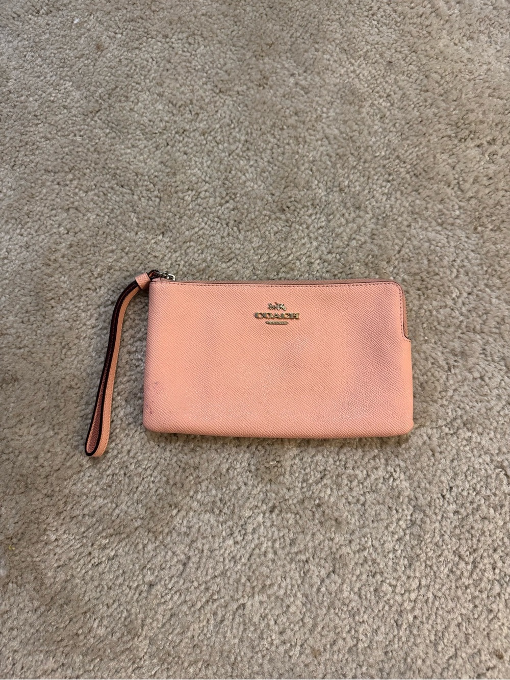 Coach Peach Pebbled Leather Wristlet with Gold Logo